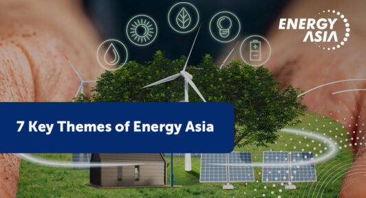 Two hands cup an image of renewable energy technologies with the text ' 7 Key Themes of Energy Asia' on the image.